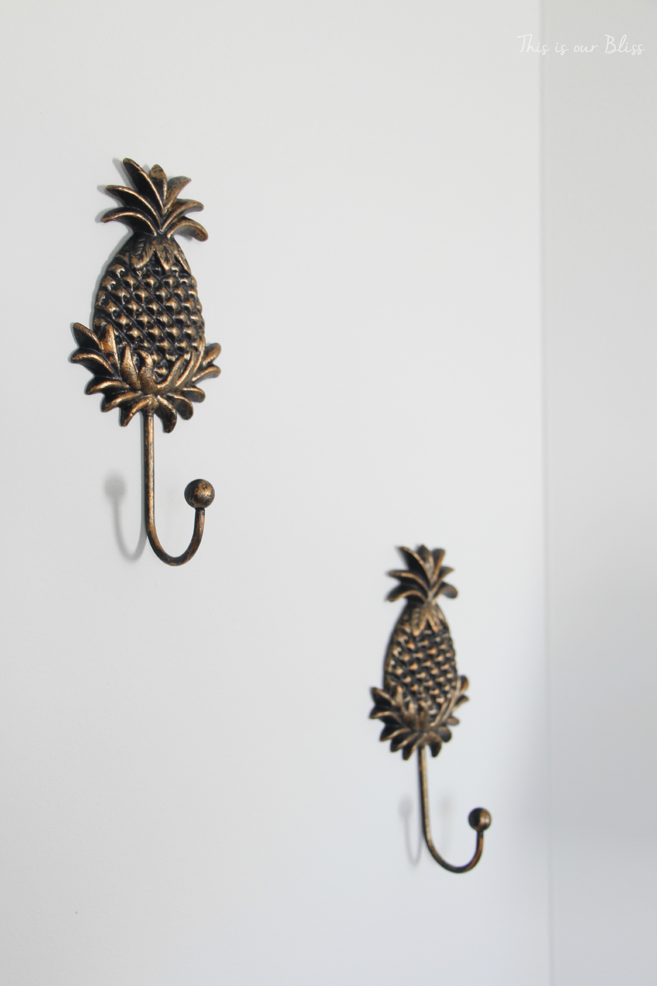 gold pineapple wall hooks - guestroom revamp - This is our Bliss