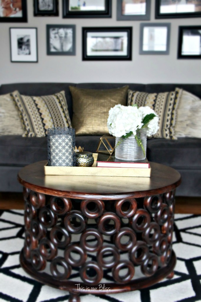 how to style a coffee table - coffee table styling - formal living room couch - gallery wall - elements of a well-styled coffee table - gold detail - back to basics - This is our bliss