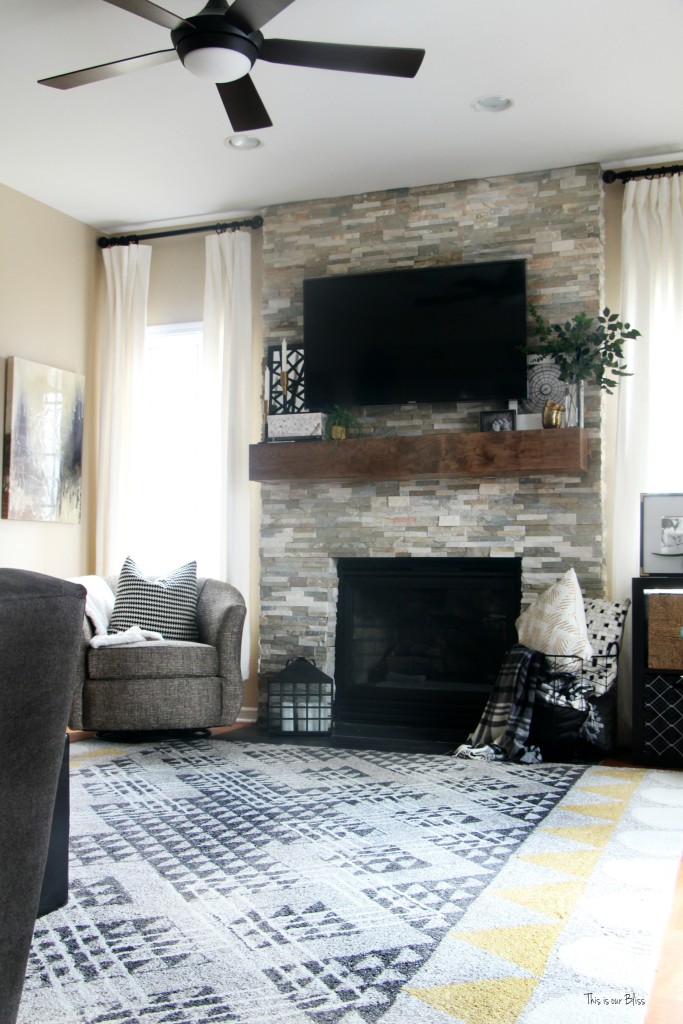 How to style a mantle table top styling hop family room mantle styling and rug This is our Bliss www.thisisourbliss.com