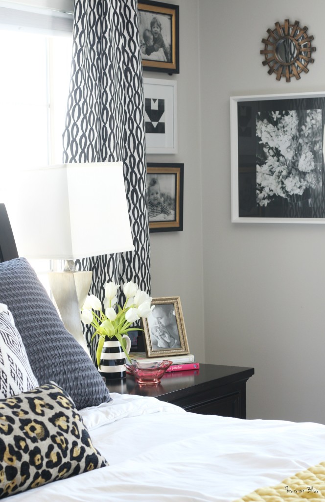 New year new room master bedroom refresh black and white curtains with corner gallery wall with black, white and gold frames leopard pillow This is our Bliss www.thisisourbliss.com
