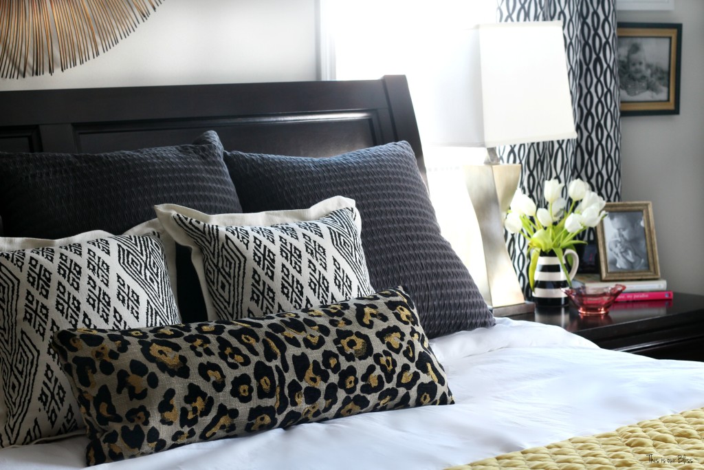 New year new room master bedroom refresh challenge - pattern play bedroom leopard pillow with black and white accents nightstand styling This is our Bliss www.thisisourbliss.com