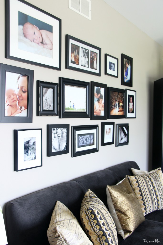 formal living room gray couch with all black frame gallery wall This is our Bliss www.thisisourbliss.com