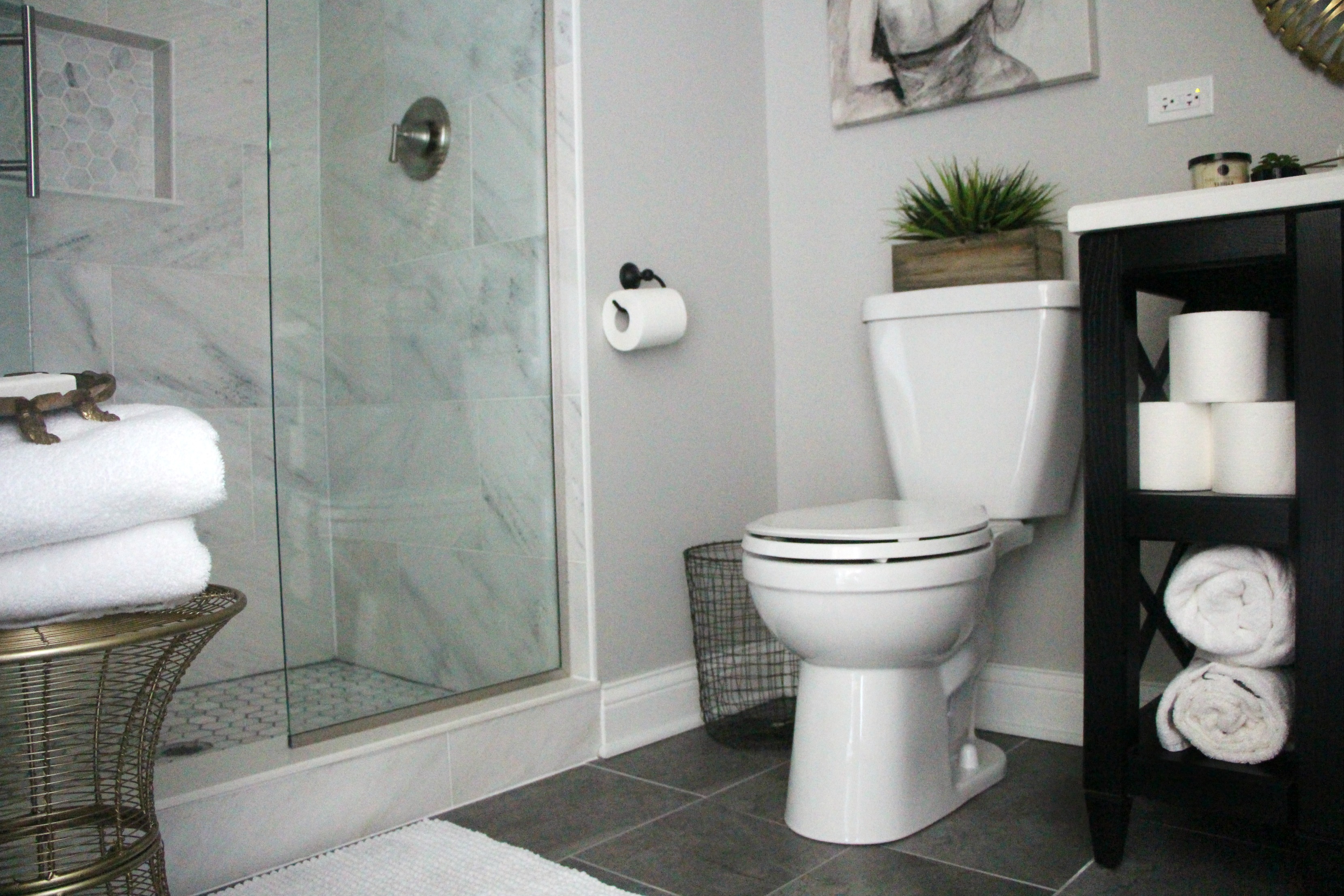 How to Create a Neutral  Glam Basement Bathroom  This is 