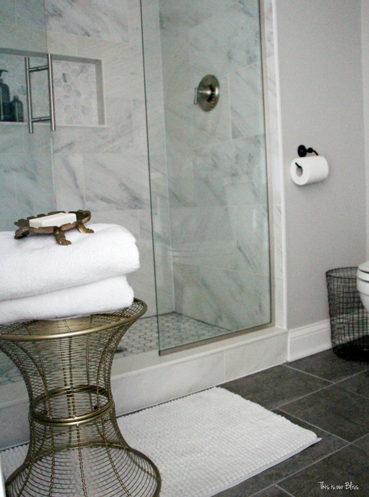 basement bathroom reveal marble shower white gray gold and black bathroom This is our Bliss