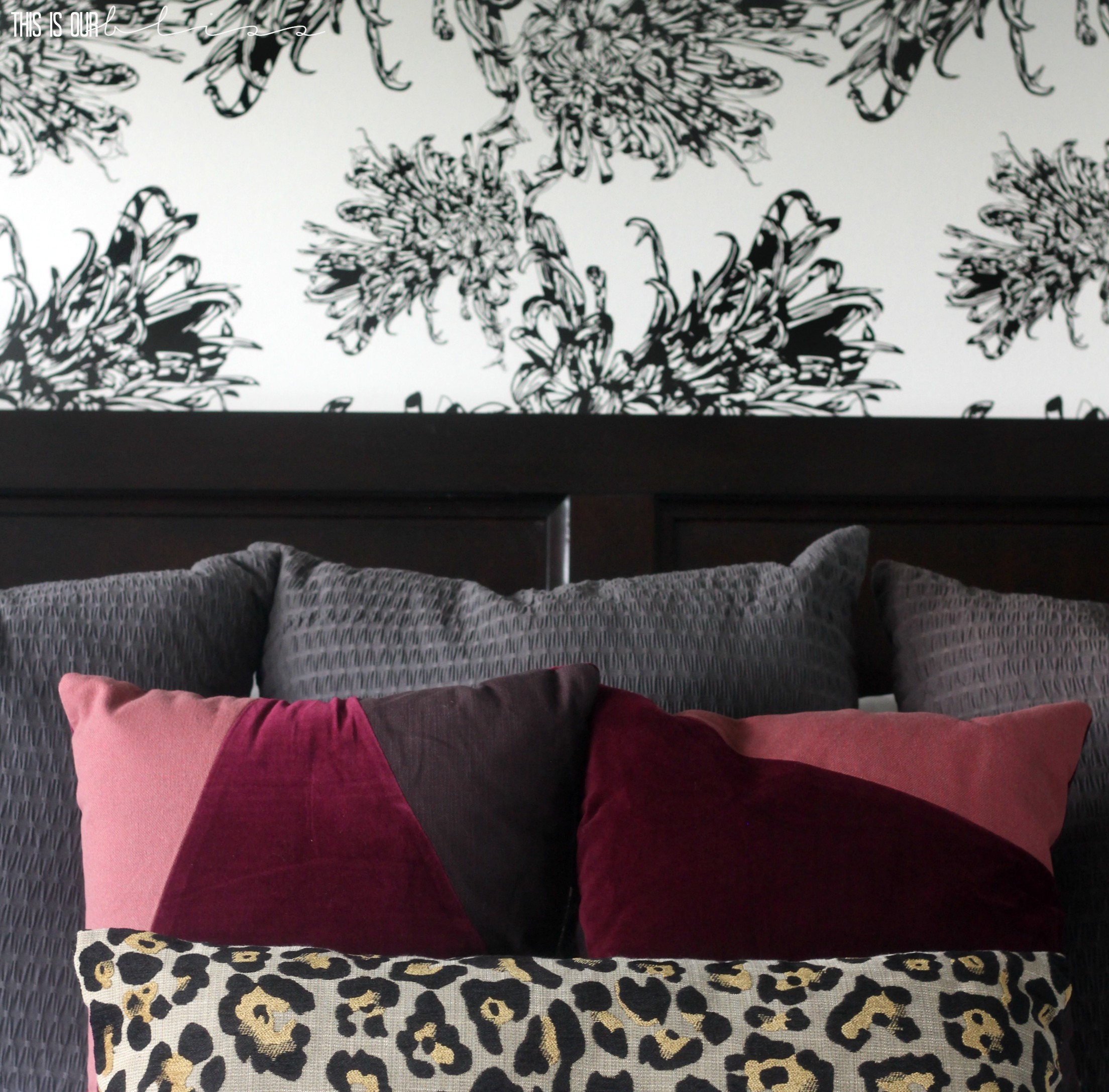 Chic wallpaper with berry colored and leopard print pillows | This is our Bliss | www.thisisourbliss.com