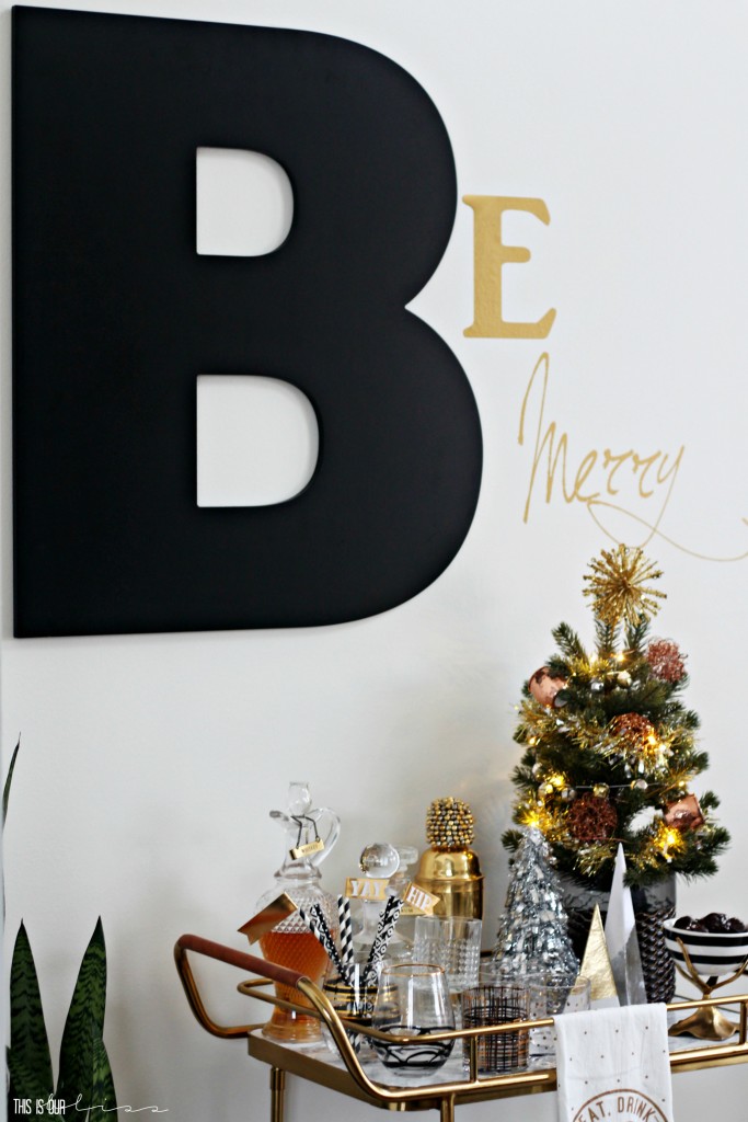 A Merry and Metallic Christmas Home | 12 Days of Holiday Homes Tour 2016: This is our Bliss Christmas Living Room with holiday B ar Cart with Metallic Accents || www.thisisourbliss.com