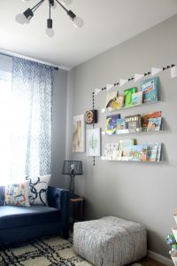 Stylish and Bold Modern Playroom | Eclectic Modern Safari space for kids | Neutral decor with pops of color | Acrylic bookshelves | This is our Bliss