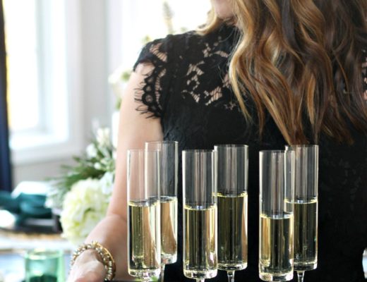 LBD with champagne flutes - the perfect little black dress for the holidays - This is our Bliss
