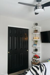 Big Boy Room Reveal with color pattern and bold black accents - floating wall shelf in a boy room - This is our Bliss