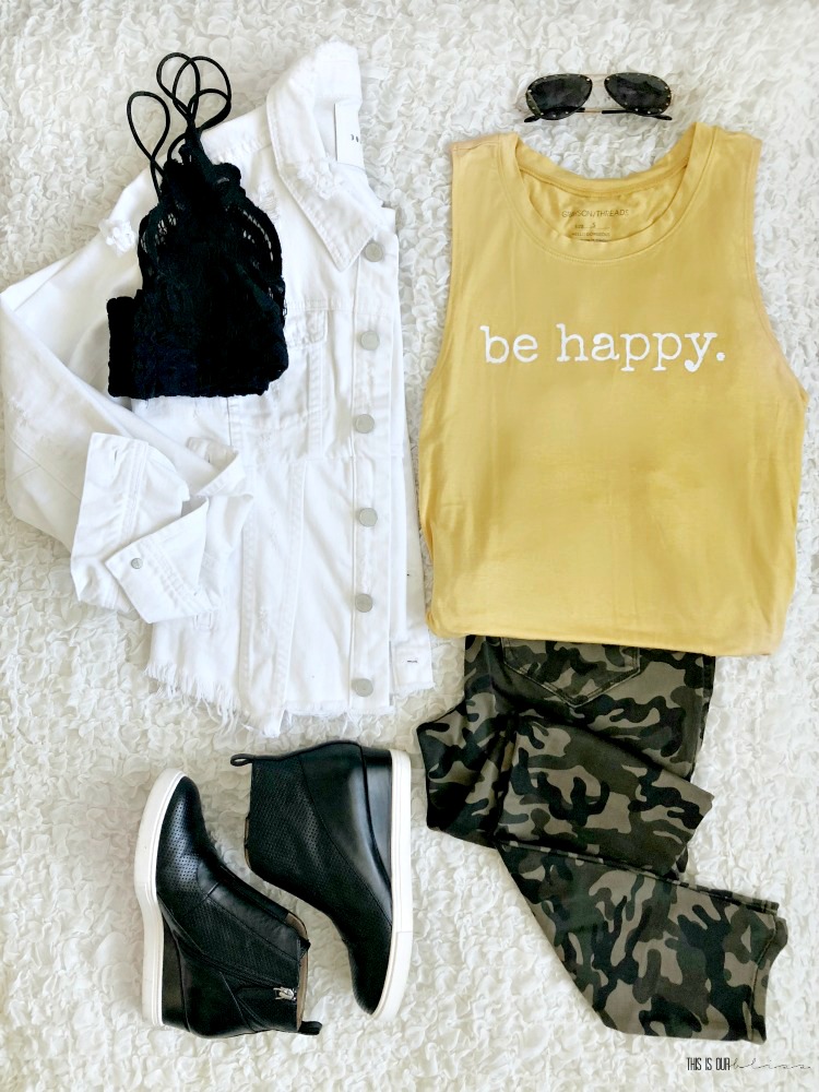 https://www.thisisourbliss.com/wp-content/uploads/2019/03/5-ways-to-wear-a-Typography-tank-top-this-Spring-be-happy-tank-top-with-camo-pants-white-jean-jacket-black-high-top-sneaker-wedges-This-is-our-Bliss.jpg