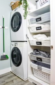 small_laundry_room-with mesh baskets pegboard