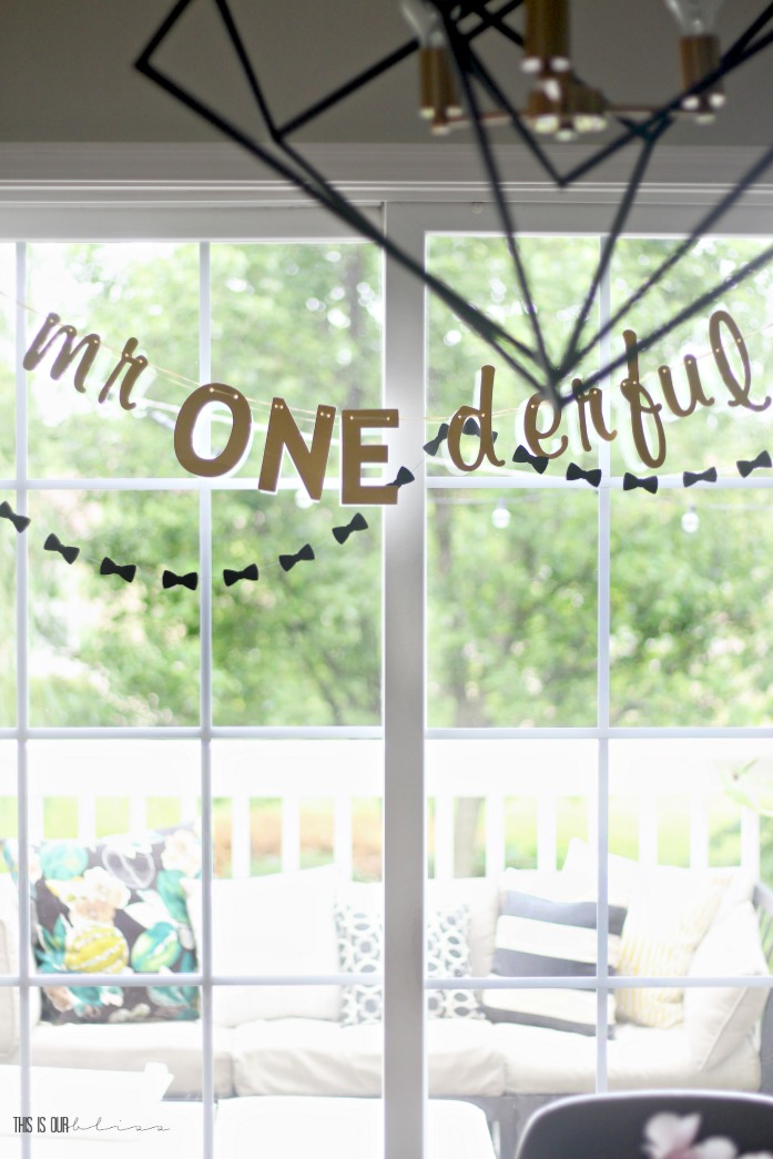 Mr. ONE-derful 1st birthday party - gold banner with black bowties for Mr. One-derful - This is our Bliss