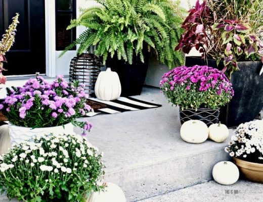 Fall Front porch with mums planters lanterns white pumpkins - easy ways to decorate your porch this Fall season - This is our Bliss