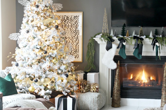 Simple and Elegant Christmas Decor in the Family Room - simple mantel with green stockings and fresh garland - This is our Bliss