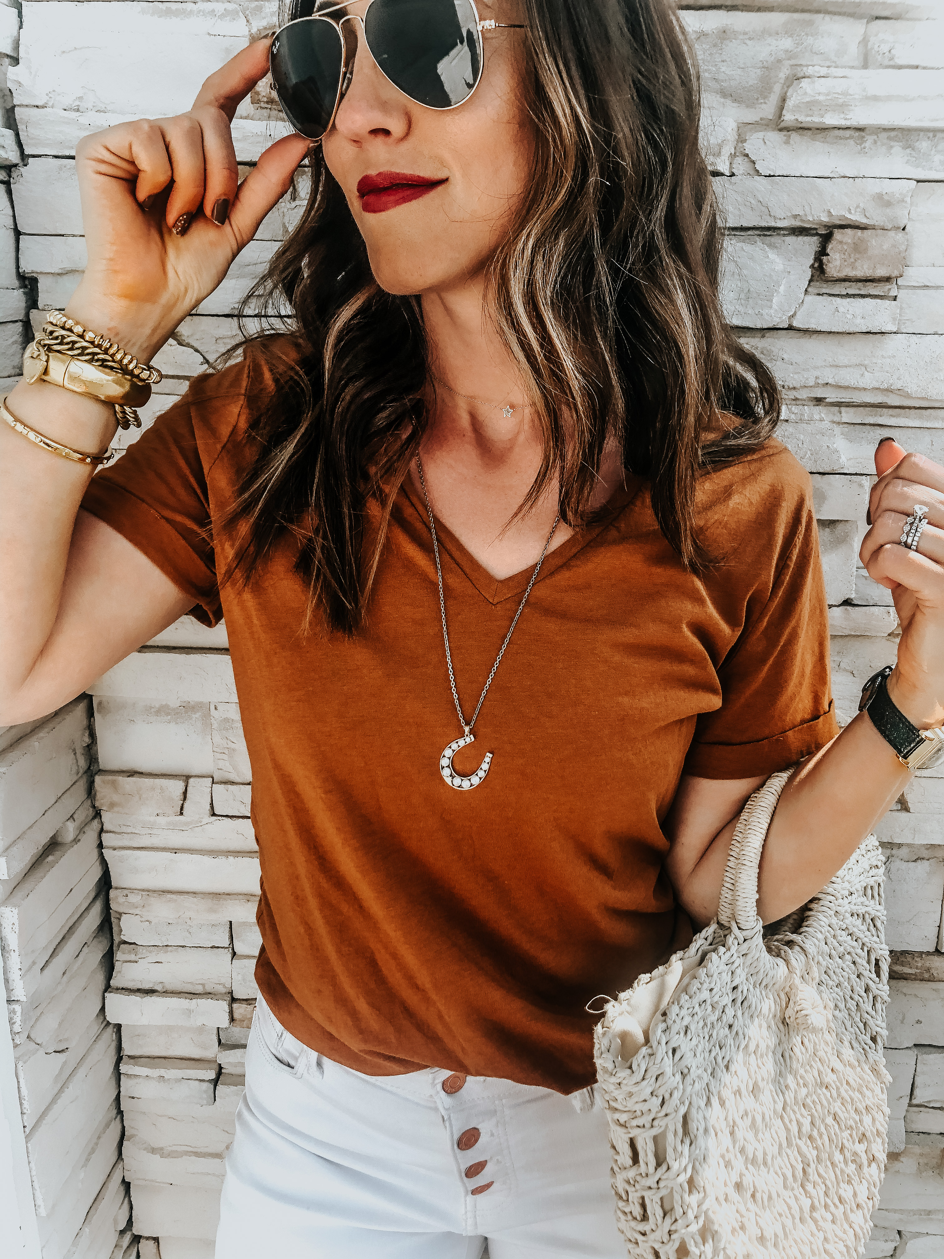 layered necklaces with rust tee shirt and white jeans and rayban aviators -  This is our Bliss