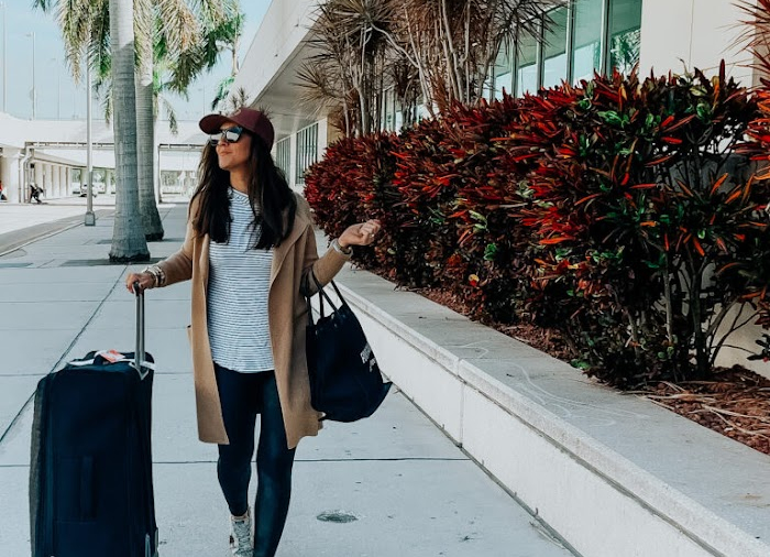 7 Stylish airplane outfits + inspo for comfy women's travel